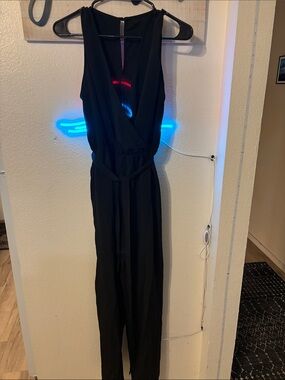 Classic Black Sleeveless Jumpsuit with Waist Tie